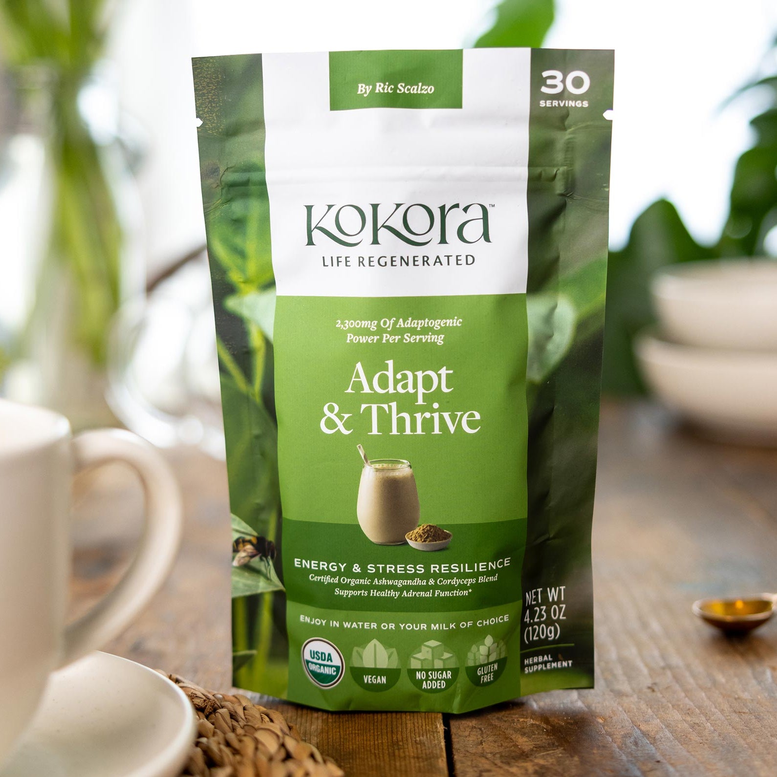 package of Adapt & Thrive powder on wooden table